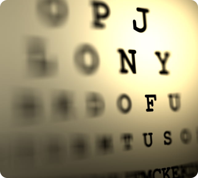 Blurred eye chart illustrating distorted central vision
